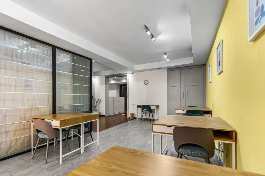 Shared desks in the first open space of the coworking center
