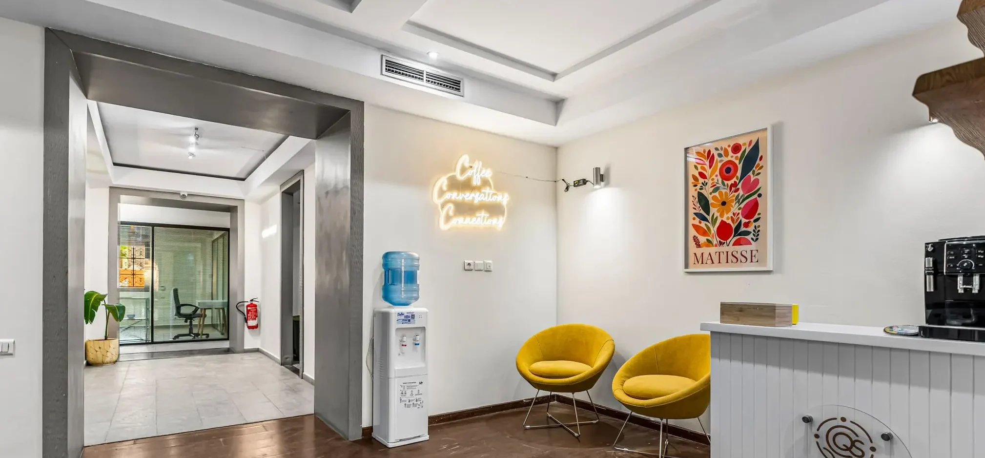Yellow armchairs in the coworking coffee area