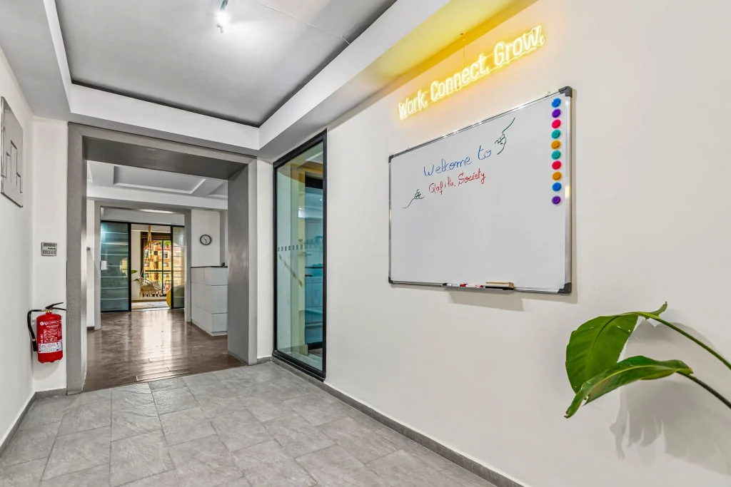 corner with a whiteboard covered in notes